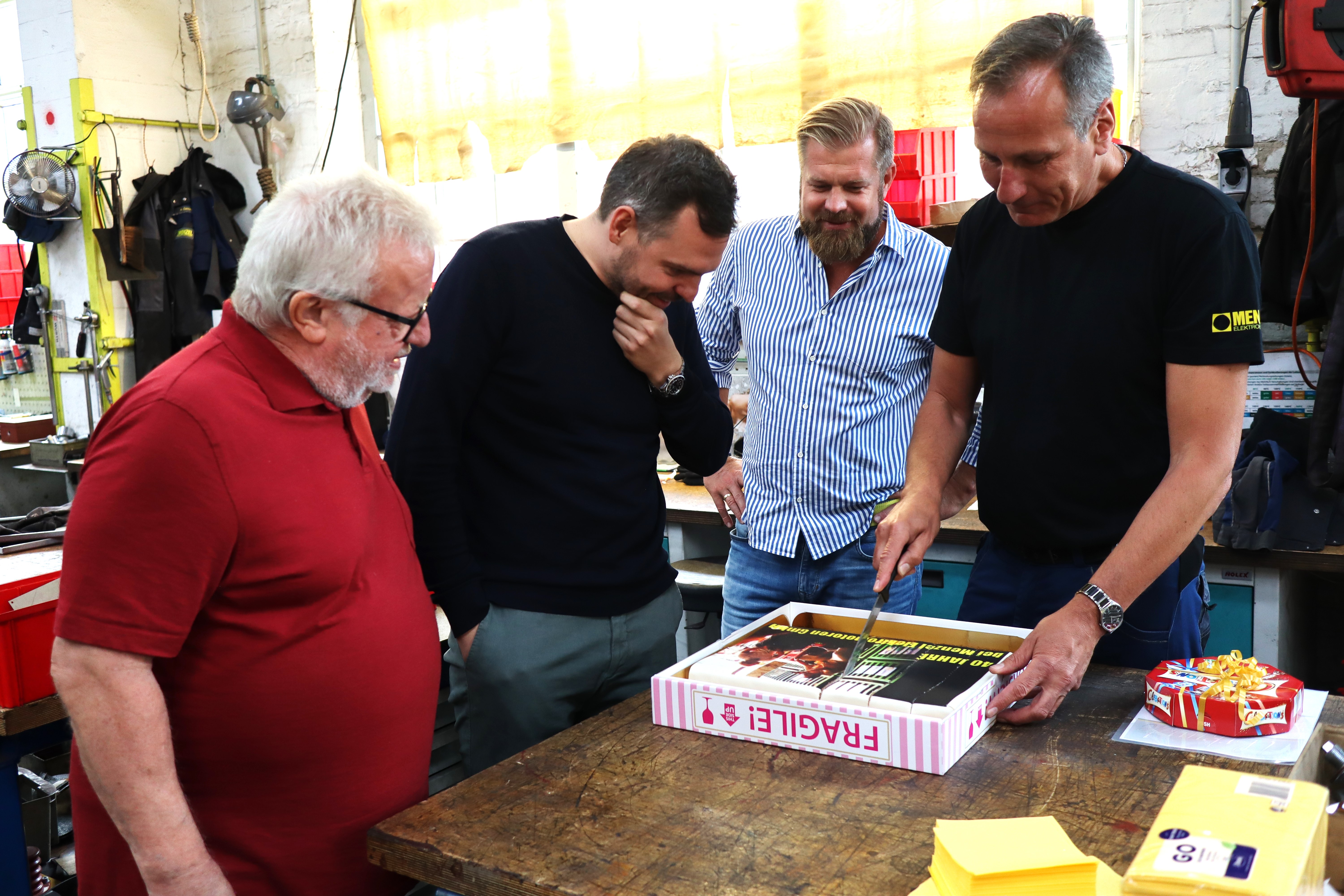 Head of Production receives anniversary cake