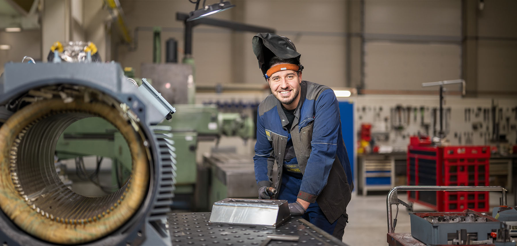 Welder smiles into the camera Welder smiles into the camera